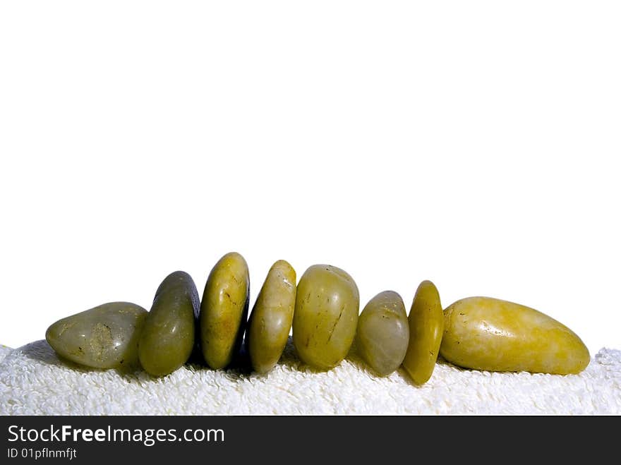 Stones on the towel in one row