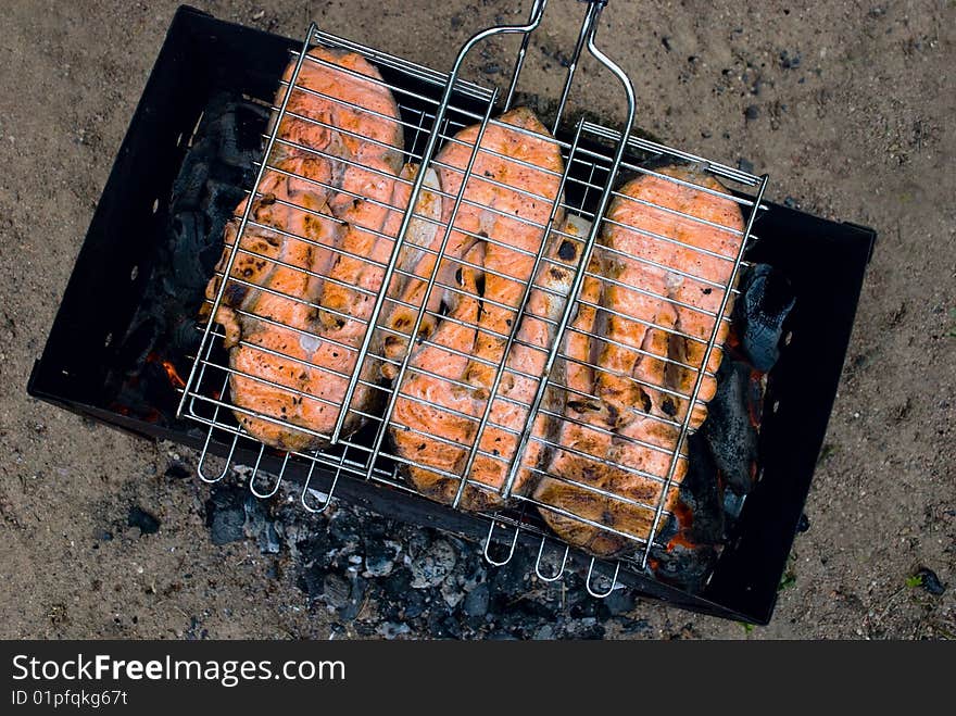 Trout steak prepared on grill. Trout steak prepared on grill