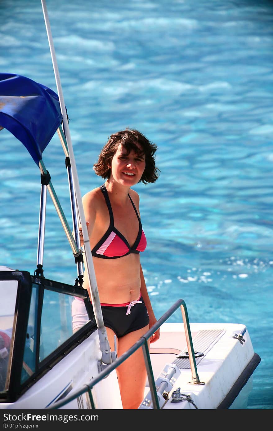 Woman on a motor boat at lagoon. Woman on a motor boat at lagoon