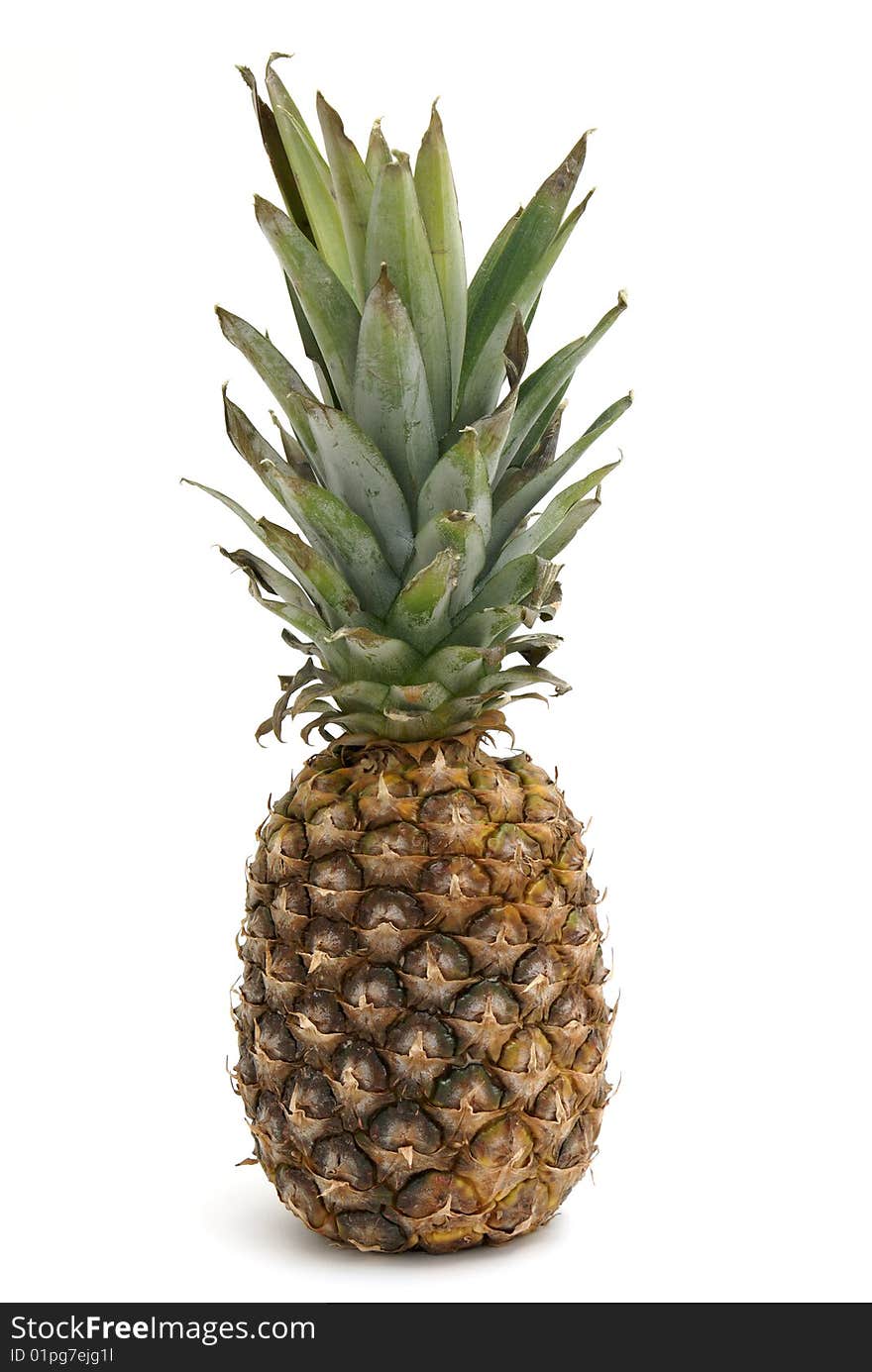 A fresh whole pineapple on white background.