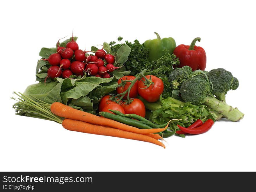 An arrangement of various vegetables on white background. An arrangement of various vegetables on white background.