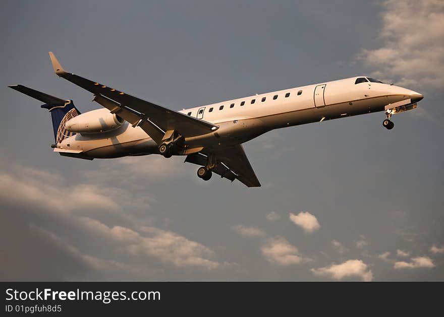 Small passenger jet plane on landing approch. Small passenger jet plane on landing approch