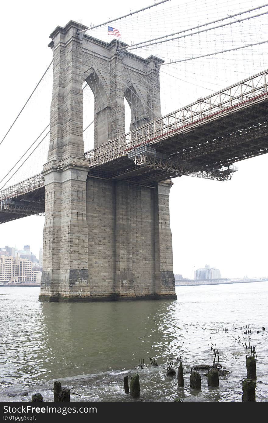 Brooklyn Bridge  against a white sky