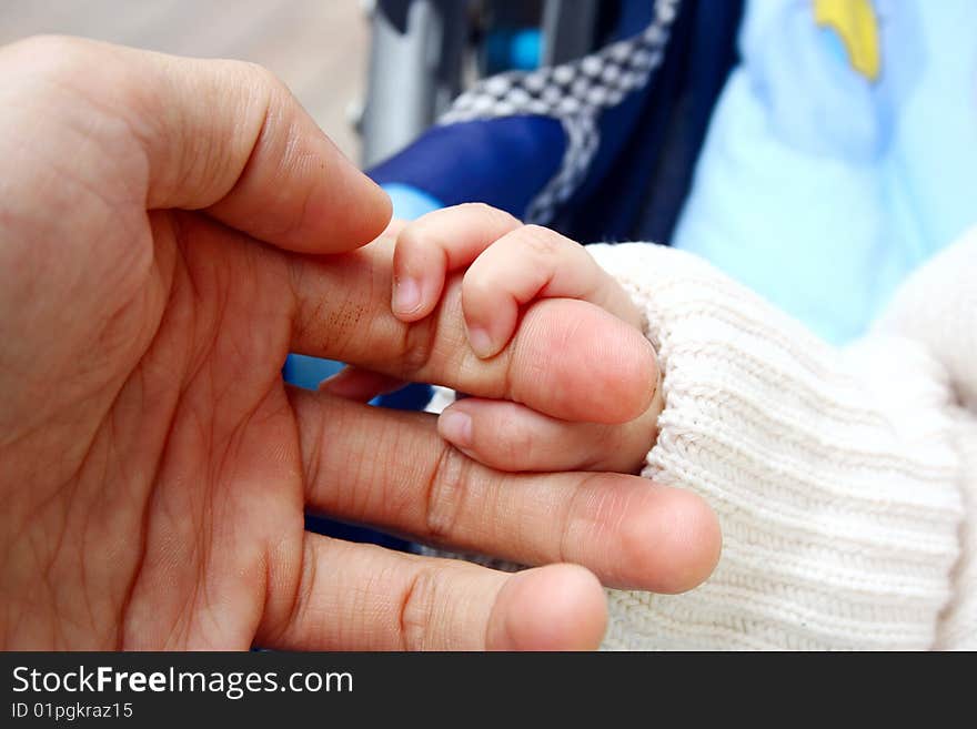 New born Baby's hand gripping for mothers finger. New born Baby's hand gripping for mothers finger