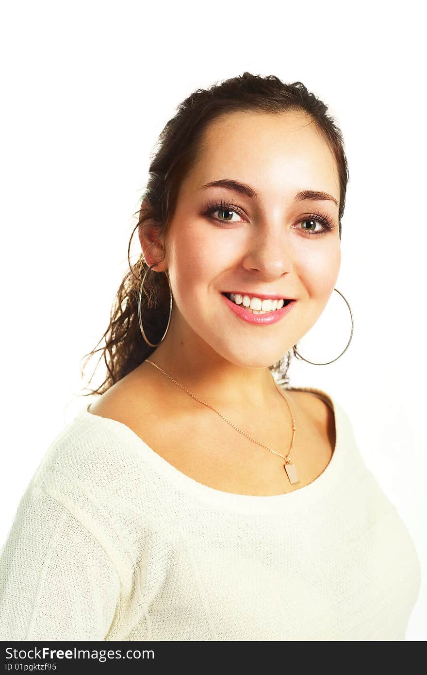 Portrait of a beautiful young brunette woman against white background. Portrait of a beautiful young brunette woman against white background