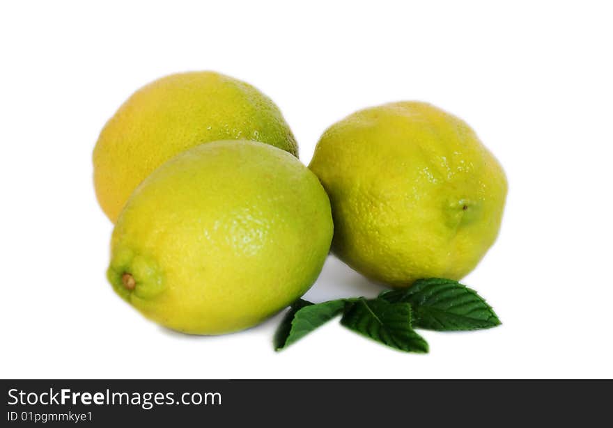 Three lemons on white background