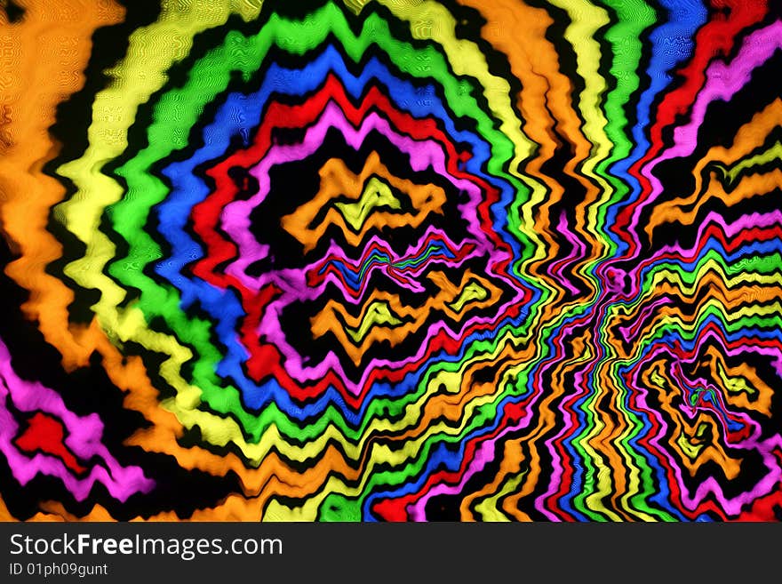 Abstract of colored ripples against a black background. Abstract of colored ripples against a black background