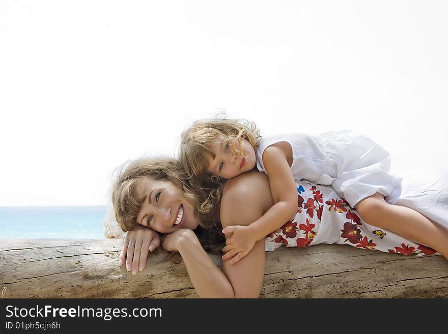 High key portrait of happy mother with baby. High key portrait of happy mother with baby