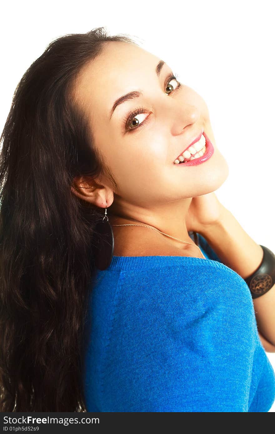 Portrait of a beautiful happy young brunette woman