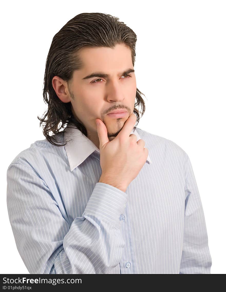 Young thoughtful dark haired caucasian man in light blue striped shirt isolated on white. Young thoughtful dark haired caucasian man in light blue striped shirt isolated on white