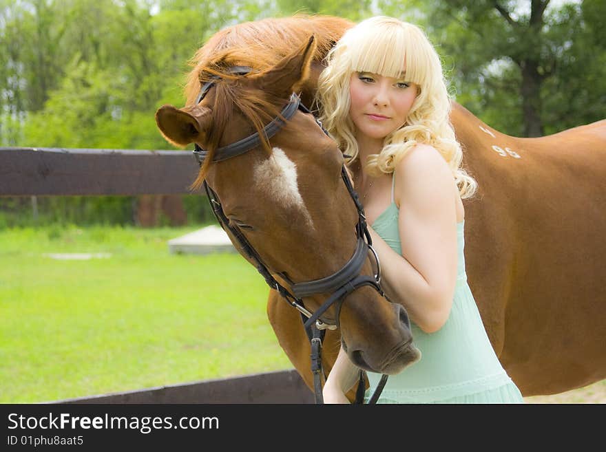 Young woman with horse