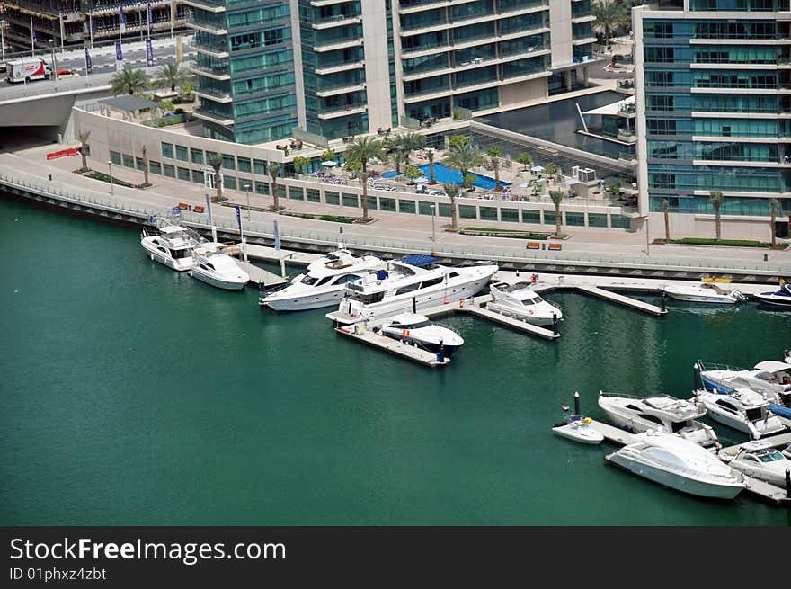 Luxury yachts berthed outside the Dubai Marina Sailing club. Luxury yachts berthed outside the Dubai Marina Sailing club