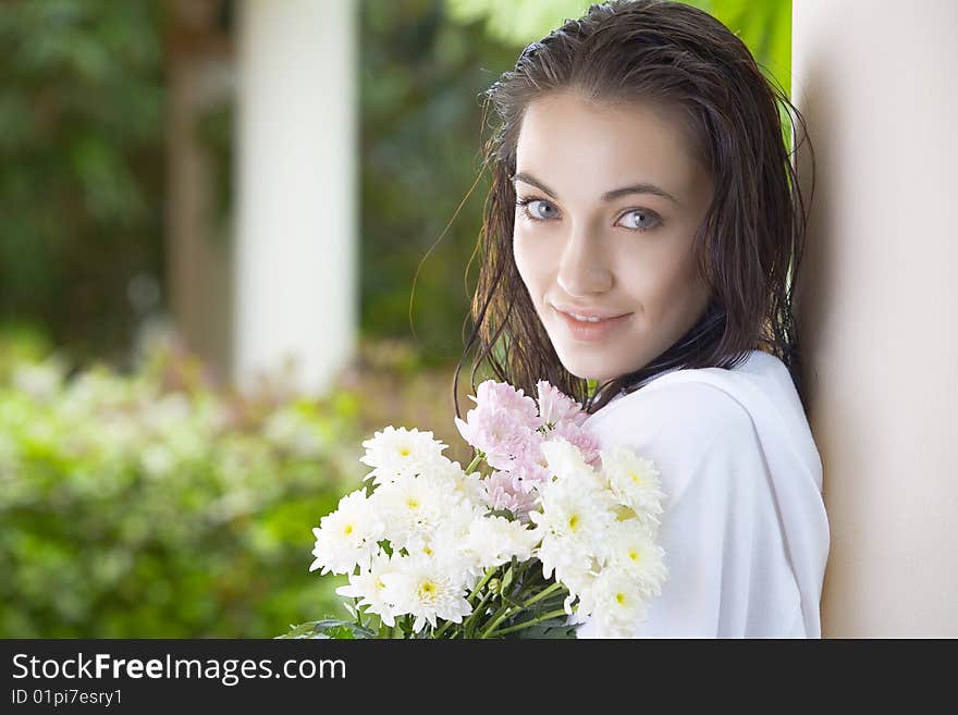 Portrait of young pretty woman in summer environment. Portrait of young pretty woman in summer environment