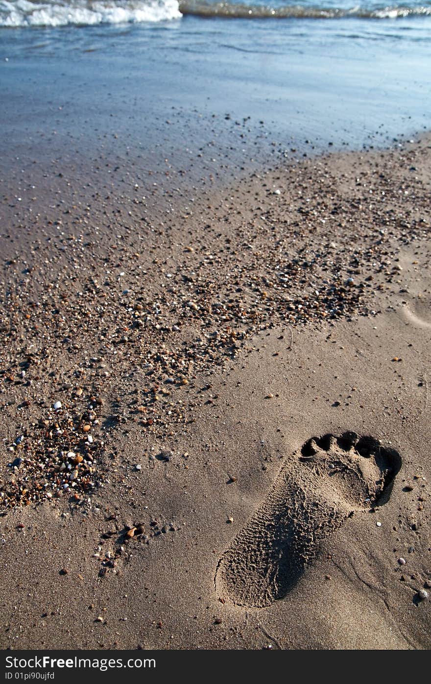 Scent male feet in the sand. Scent male feet in the sand