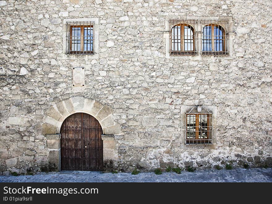 Medieval facade from an antique house in Trujillo, Spain