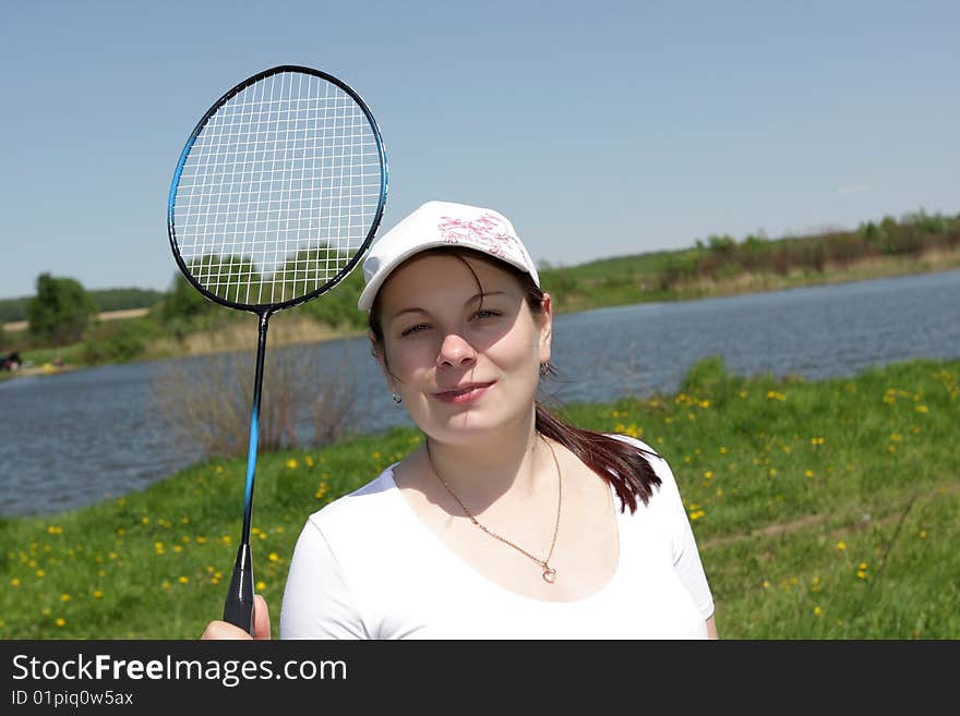 Girl poses with racket