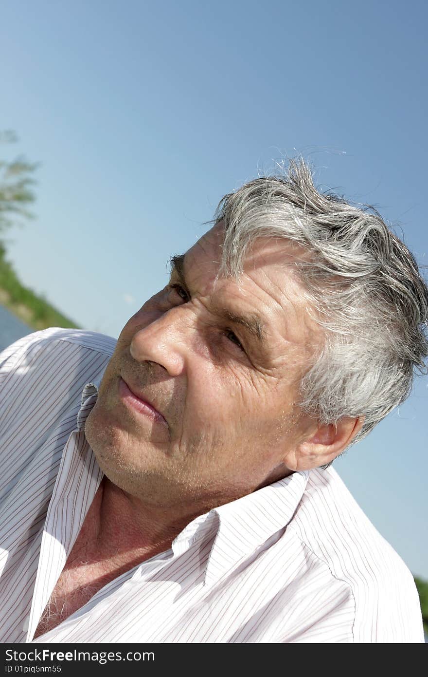 Portrait of a mature man in summer, outdoor