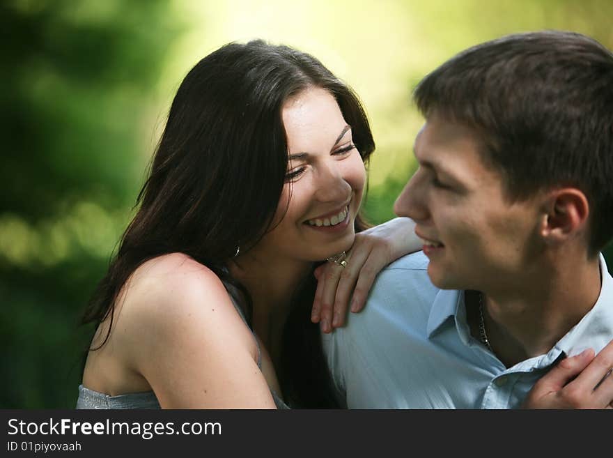 Man and woman sitting on the grass. Man and woman sitting on the grass.