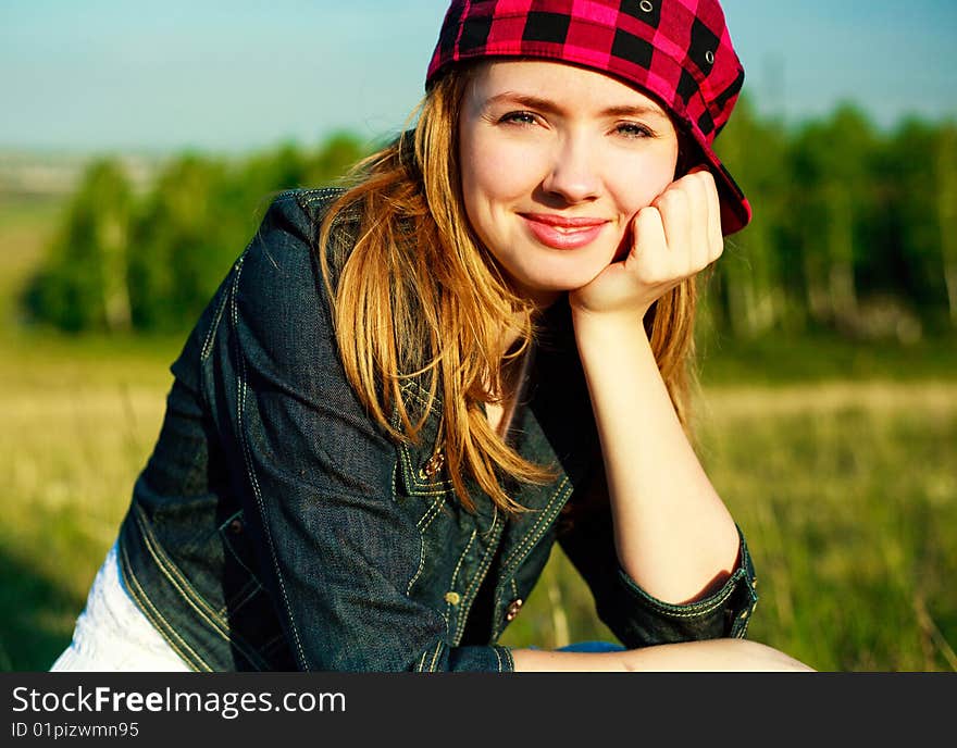 Portrait of a pretty blond girl spending time outdoor. Portrait of a pretty blond girl spending time outdoor