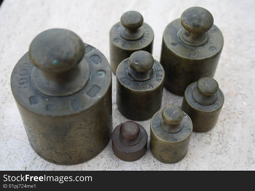 A set of different tools used with old weight instruments. A set of different tools used with old weight instruments