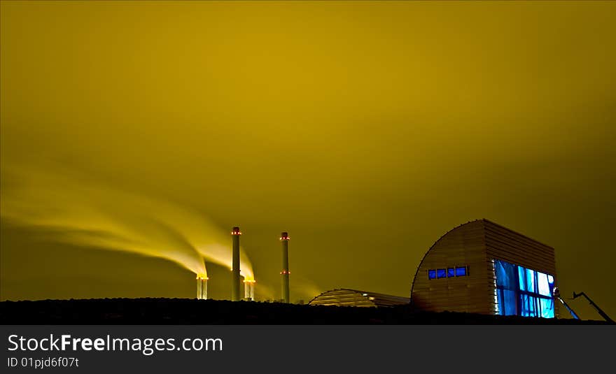 This is the informationcentre Futureland of the Maasvlakte 2 project in Rotterdam Holland with the Eenergyplant from E-on in the background