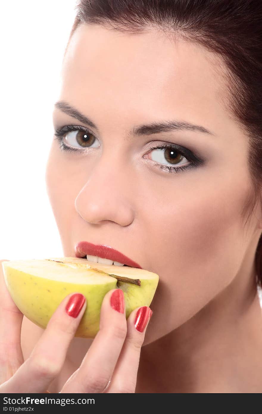 Close-up portrait of young beautiful healthy woman with yellow apple isolated on white. Close-up portrait of young beautiful healthy woman with yellow apple isolated on white