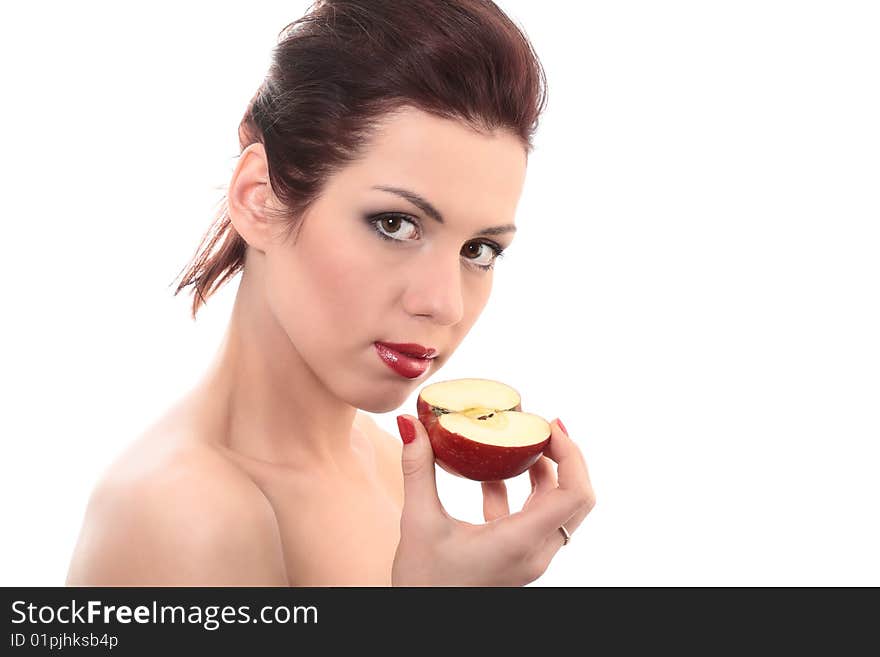 Close-up portrait of young beautiful healthy woman with half of red apple isolated on white. Close-up portrait of young beautiful healthy woman with half of red apple isolated on white