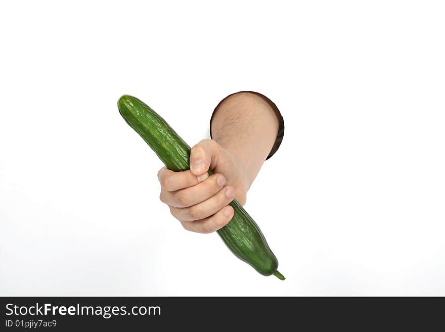 Long green cucumber in hand