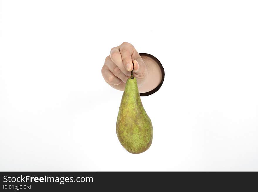 Big green pear in hand