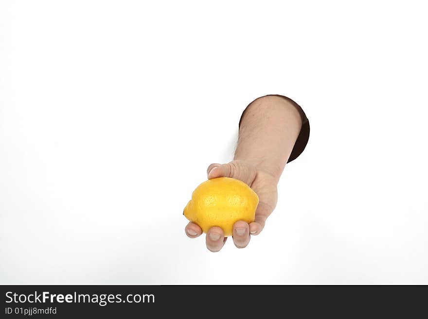 Yellow lemon in man's hand. Yellow lemon in man's hand