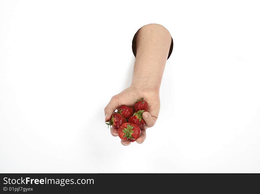 Sweet strawberry in man's hand