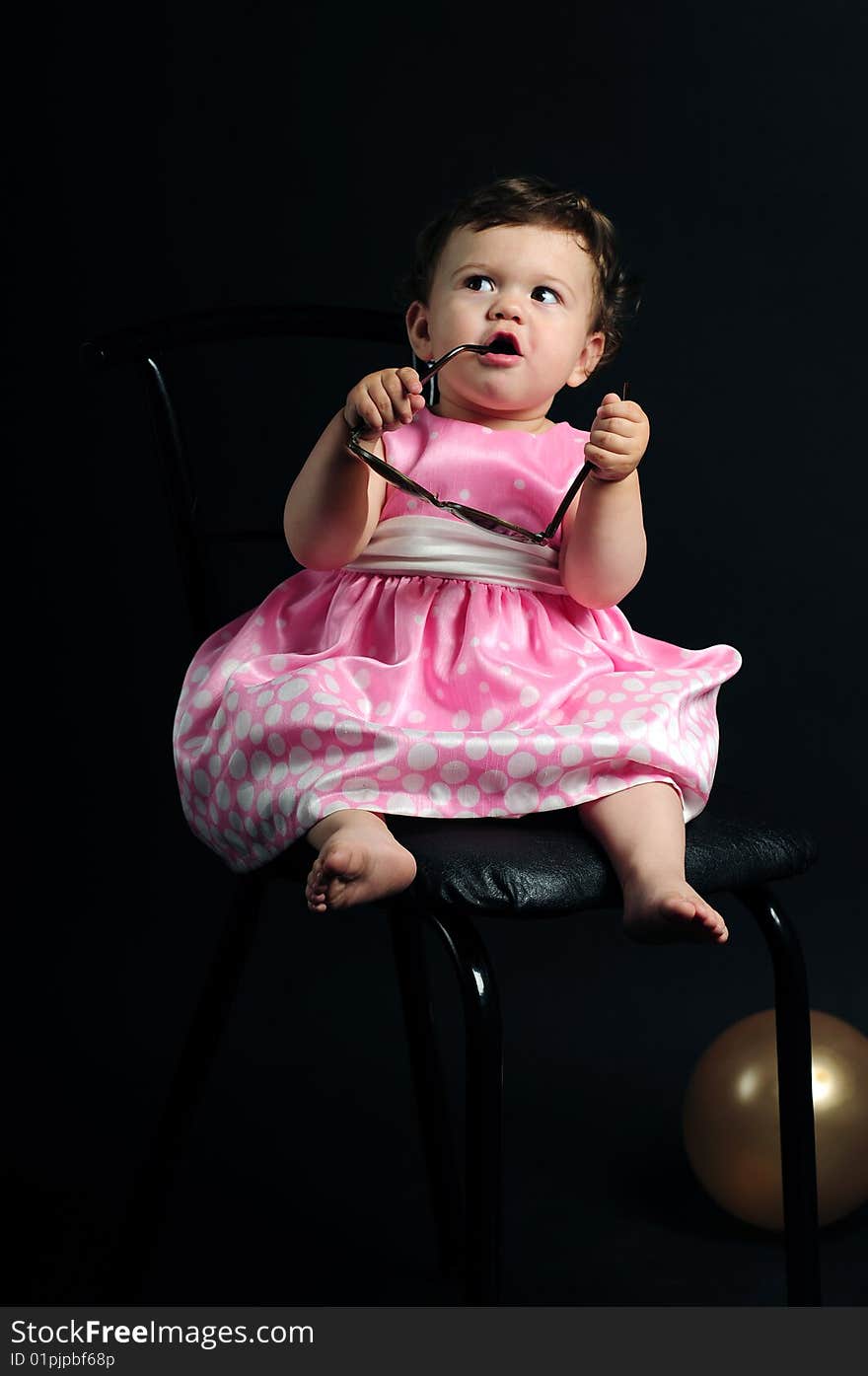 Studio shot of a baby girl. Studio shot of a baby girl