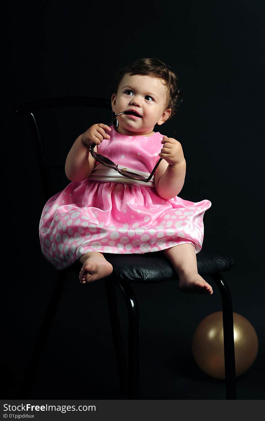 Studio shot of a baby girl. Studio shot of a baby girl