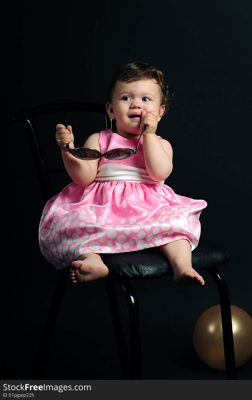 Studio shot of a baby girl. Studio shot of a baby girl