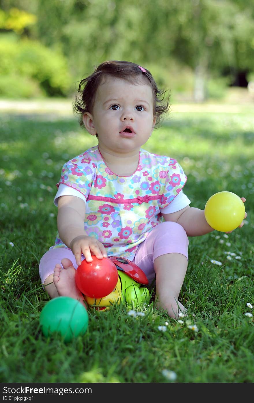 Outdoor shot of a baby girl. Outdoor shot of a baby girl