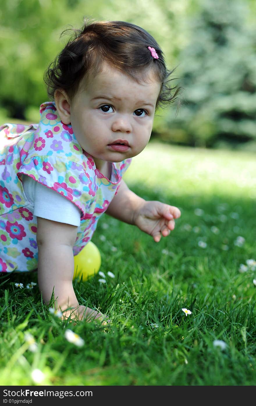 Baby girl in park