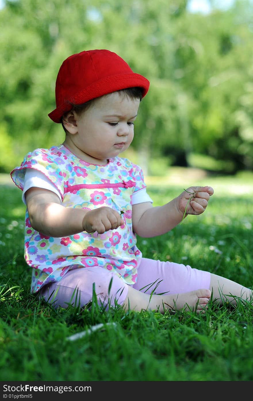 Baby girl in park