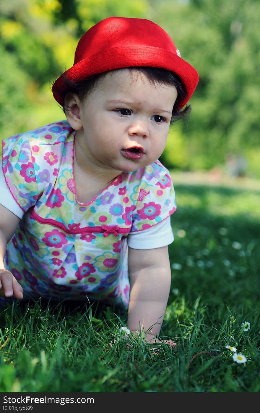 Baby girl in park