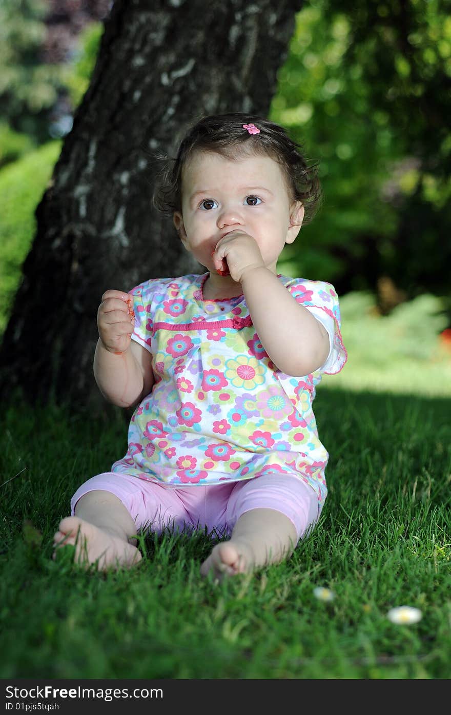 Baby girl in park