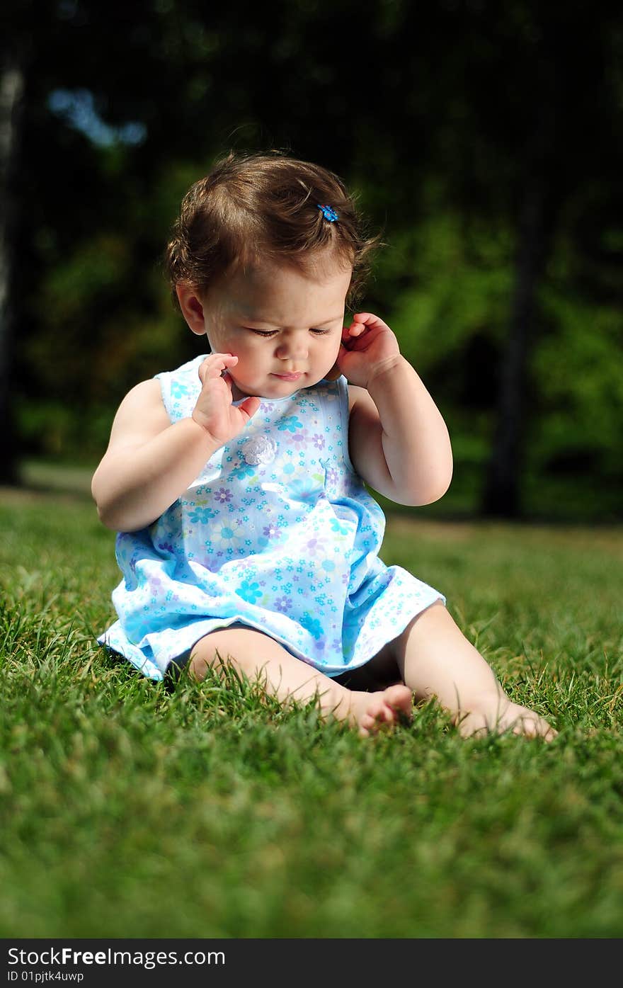 Baby girl in park