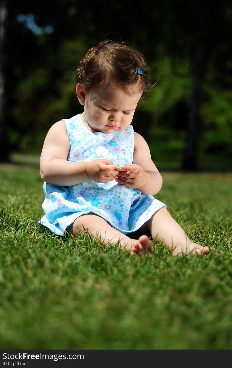 Baby girl in park