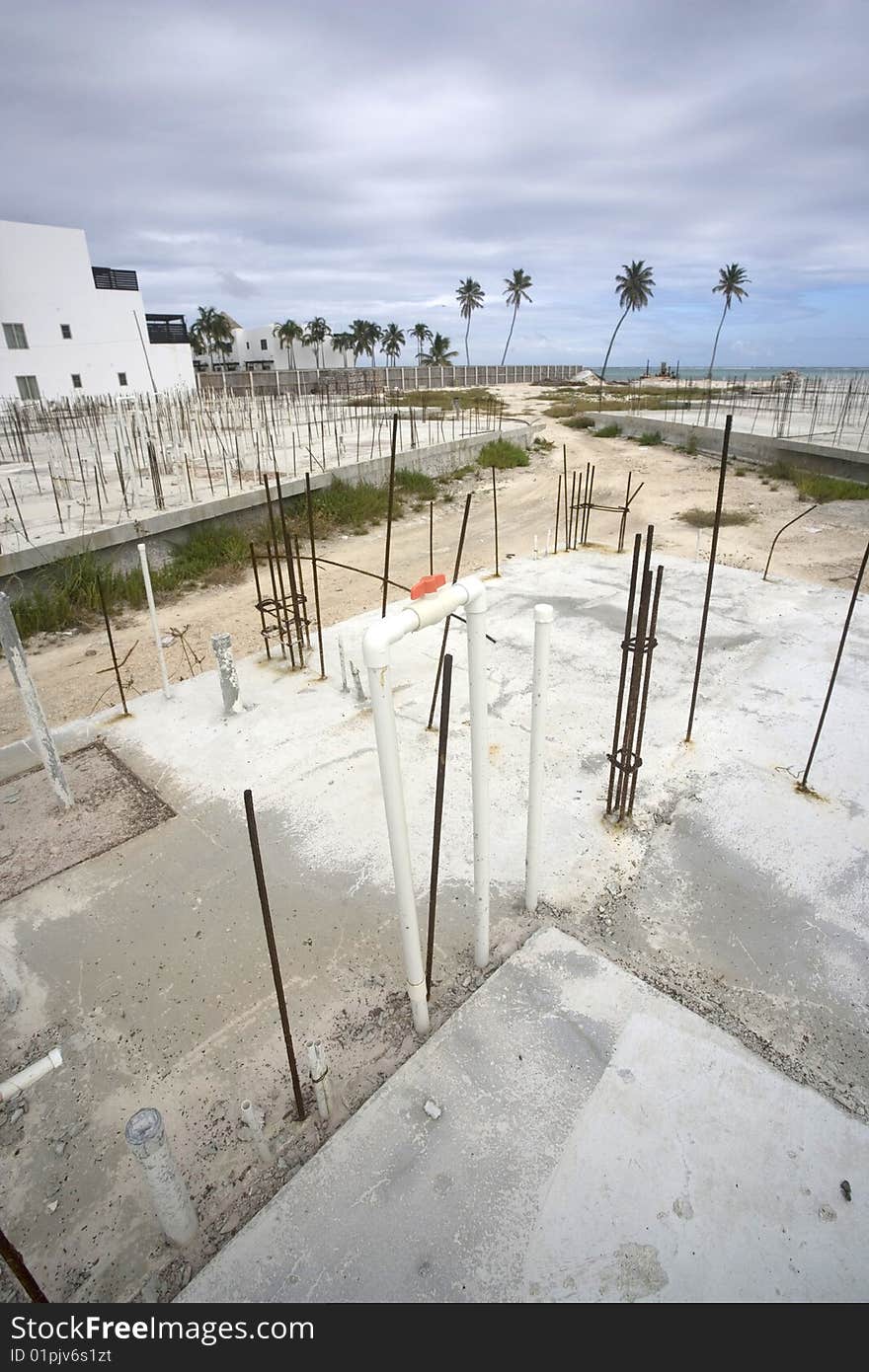 An abandoned construction site sits at the water's edge in the Gulf of Mexico.