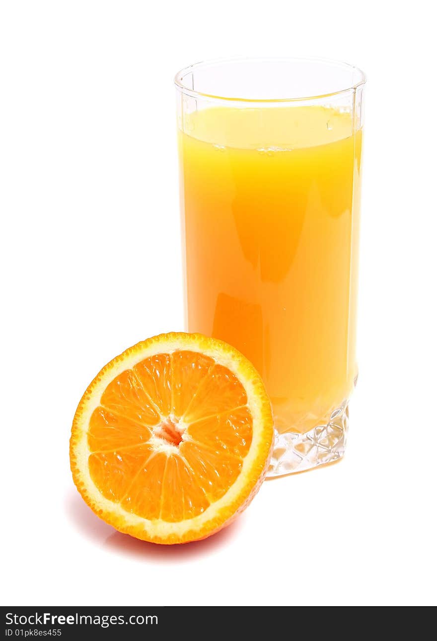 Orange and juice in glass isolated on white background