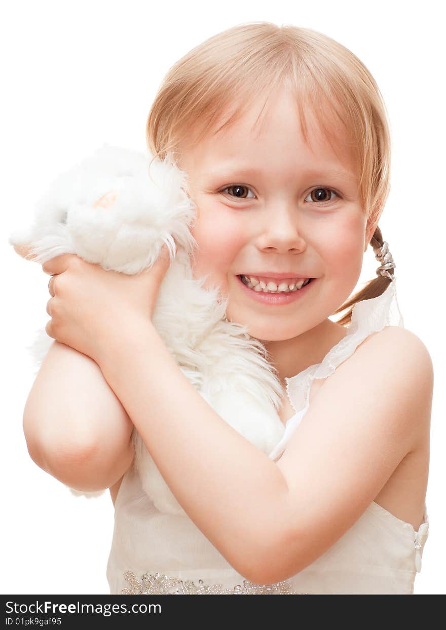 High key portrait of a little girl with a toy isolated on white