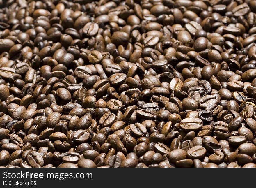 A photo of several coffee beans - background. A photo of several coffee beans - background