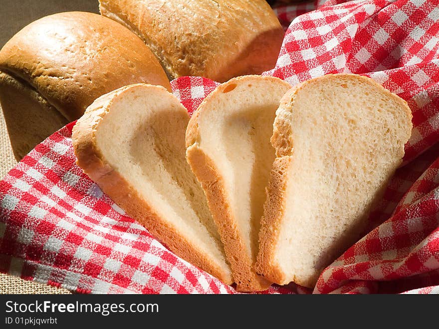 Bread And Checked Tablecloth