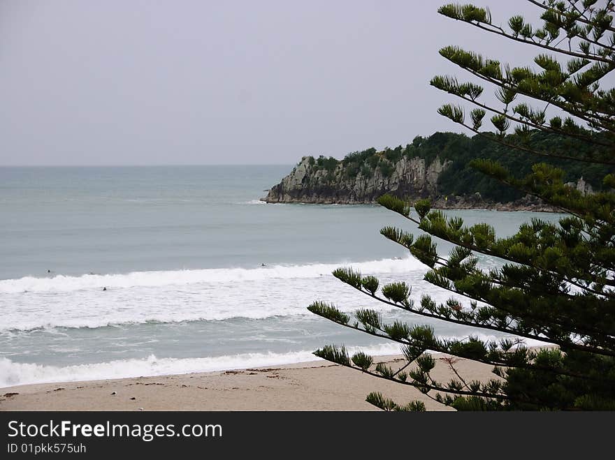 Mount Maunganui main beach surfers waiting for waves