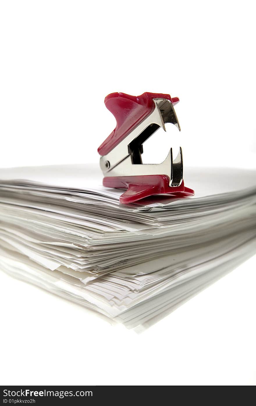 Staple puller on a sheaf of paper.