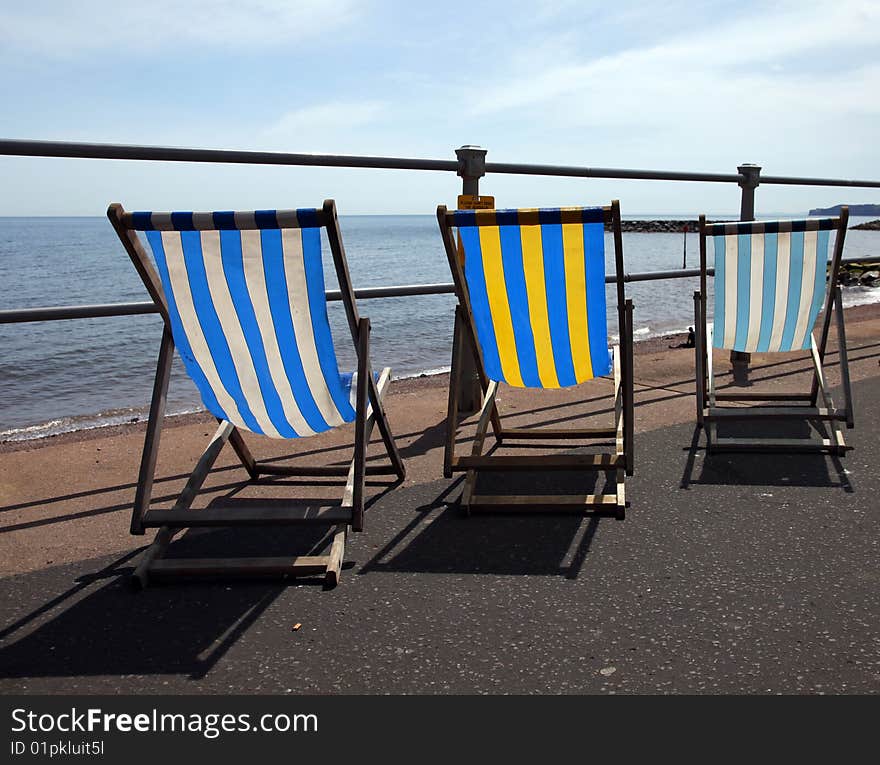 Deck chairs along sidmouth sea front