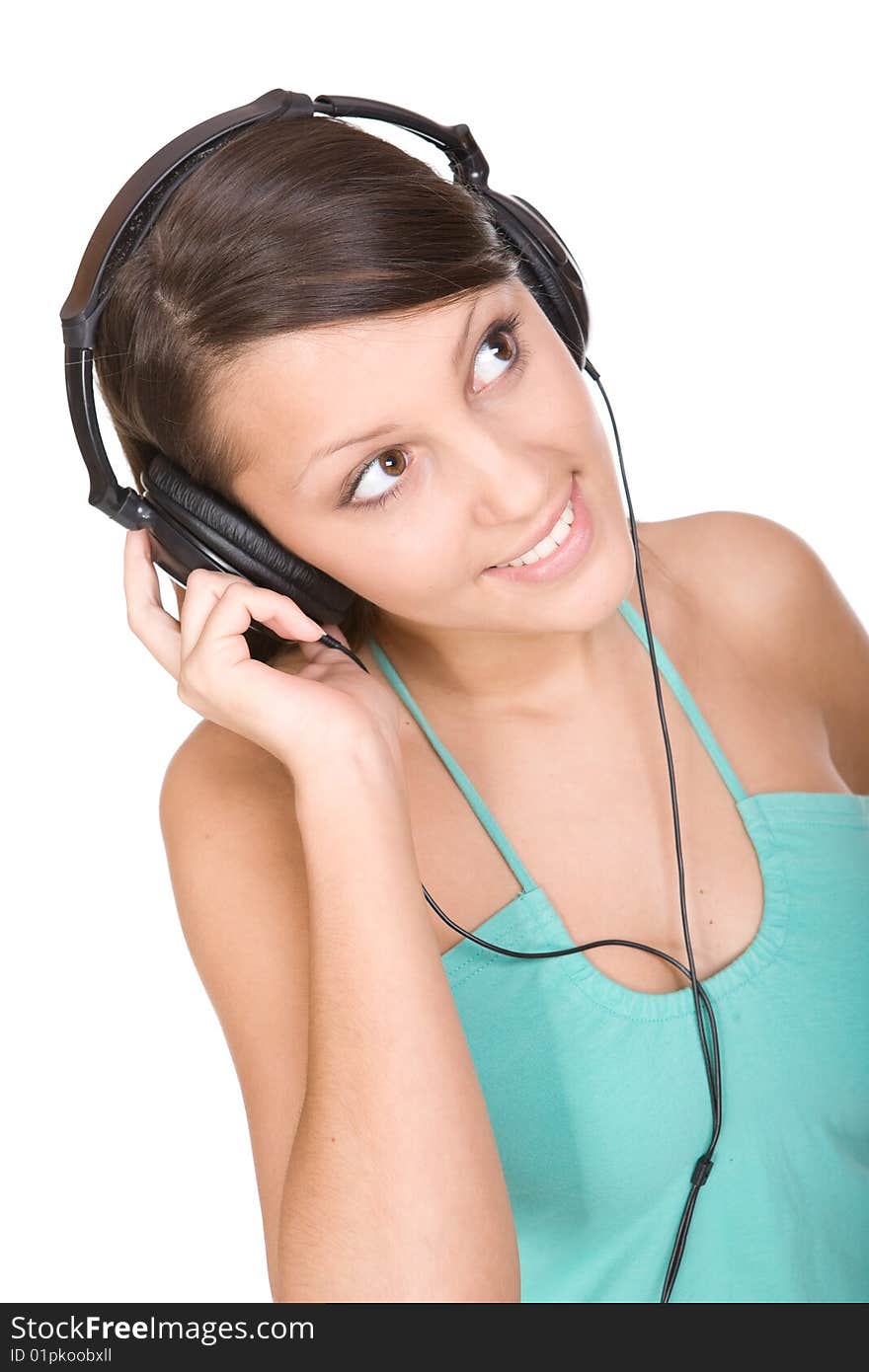 Pretty teen with headphones. over white background. Pretty teen with headphones. over white background